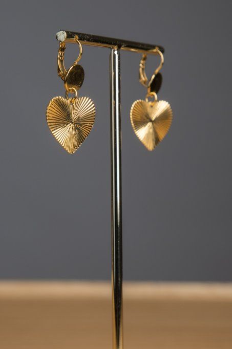 Les Boucles d'oreilles signature Carlotta